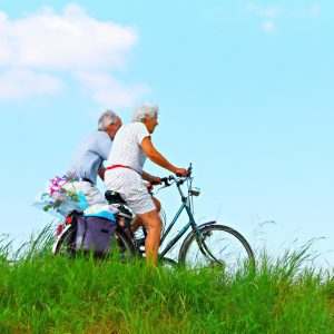 person, man, woman, people, couple, nature, elderly, cycling, together, two, side by side, exercise, lifestyle, healthy, motion, destination, sunny day, summer, editorial